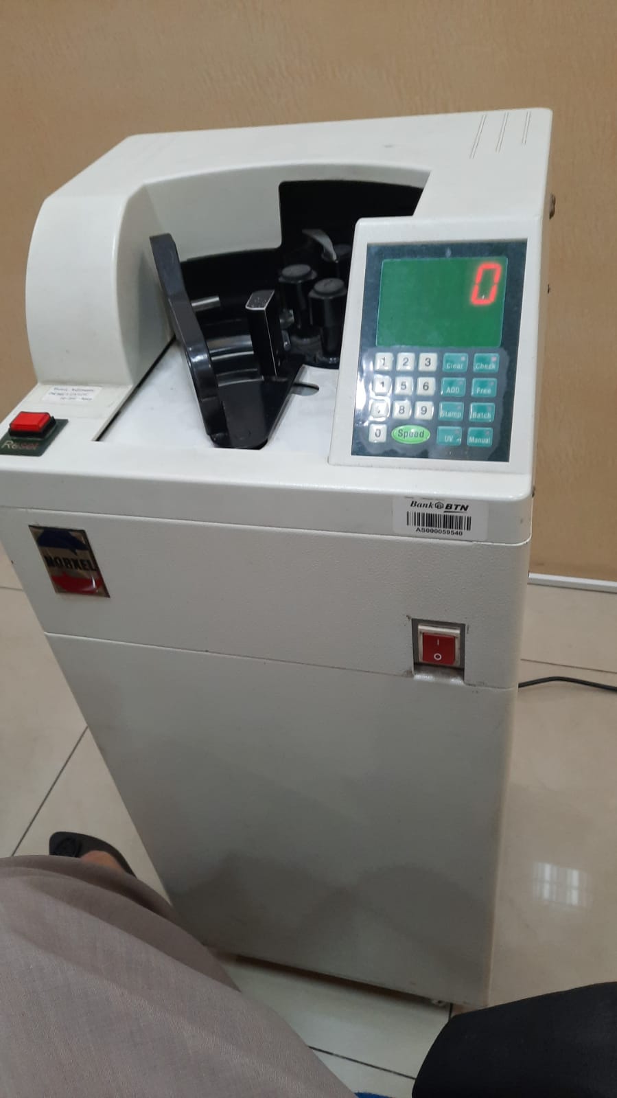 Service mesin hitung uang kertas