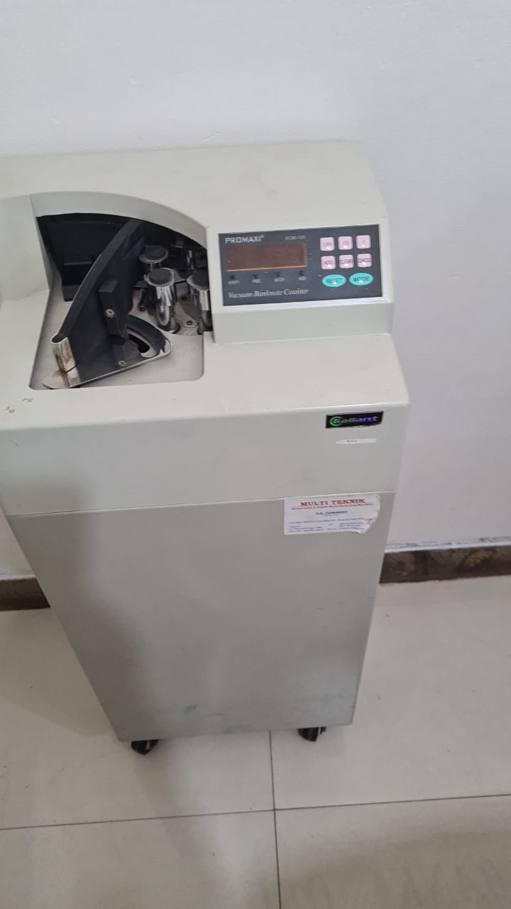 Service mesin hitung uang kertas